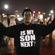 Demonstrators protest in front of the police station in Ferguson, Mo., March 12, 2015, in the aftermath of the fatal police shooting of Michael Brown.
Scott Olson/Getty Images